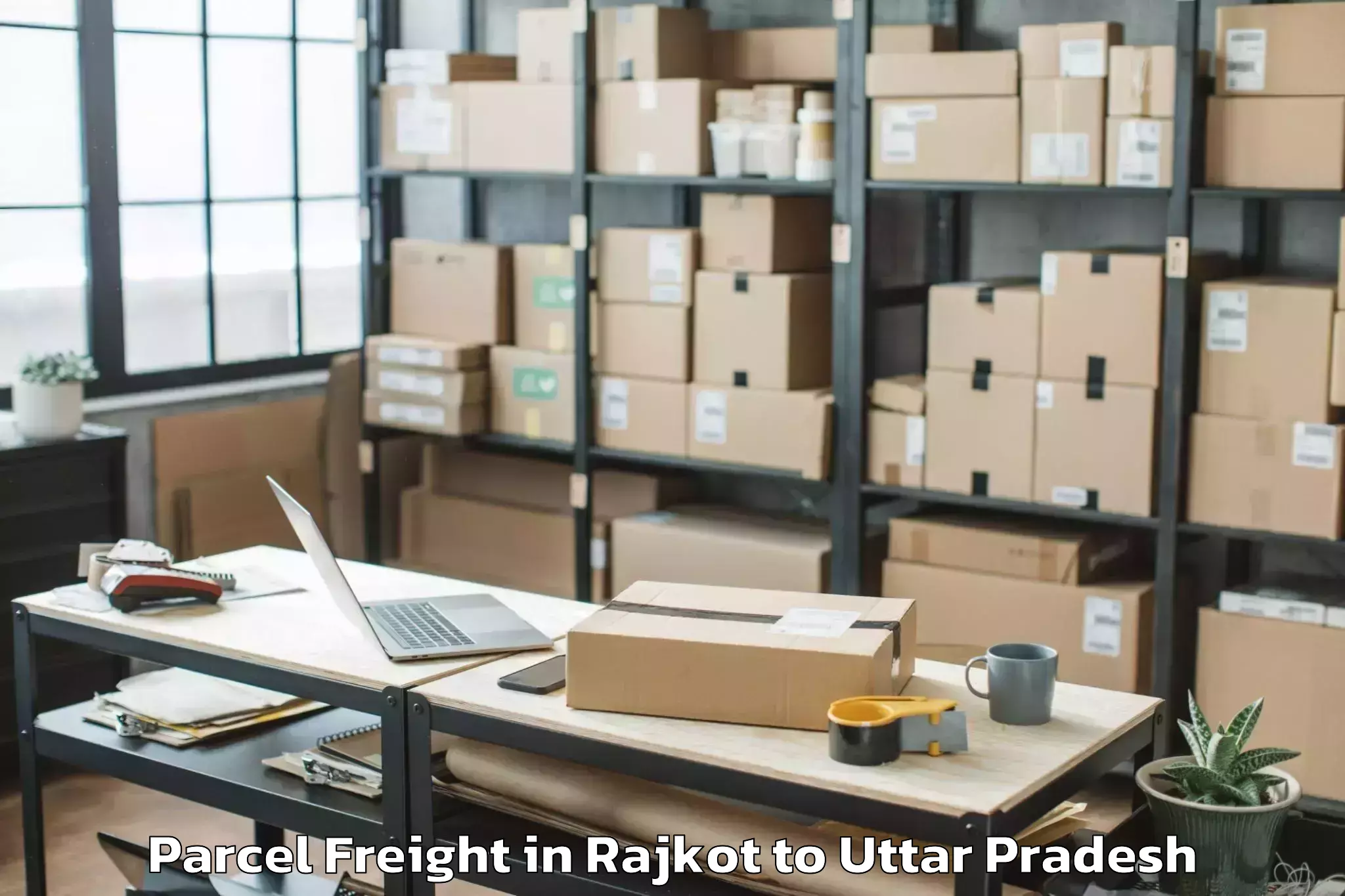 Top Rajkot to Belthara Road Parcel Freight Available